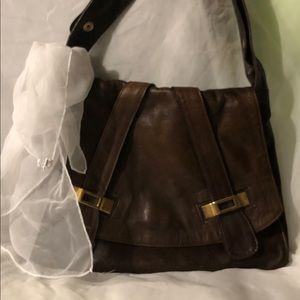 Brown Astor leather purse new with out tag